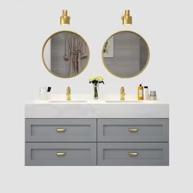 Luxurious double-sink vanity featuring rich wood finishes and polished hardware