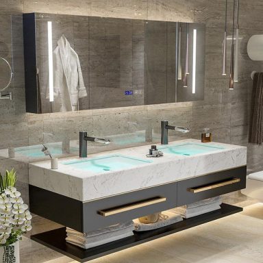 Luxurious double-sink vanity featuring rich wood finishes and polished hardware